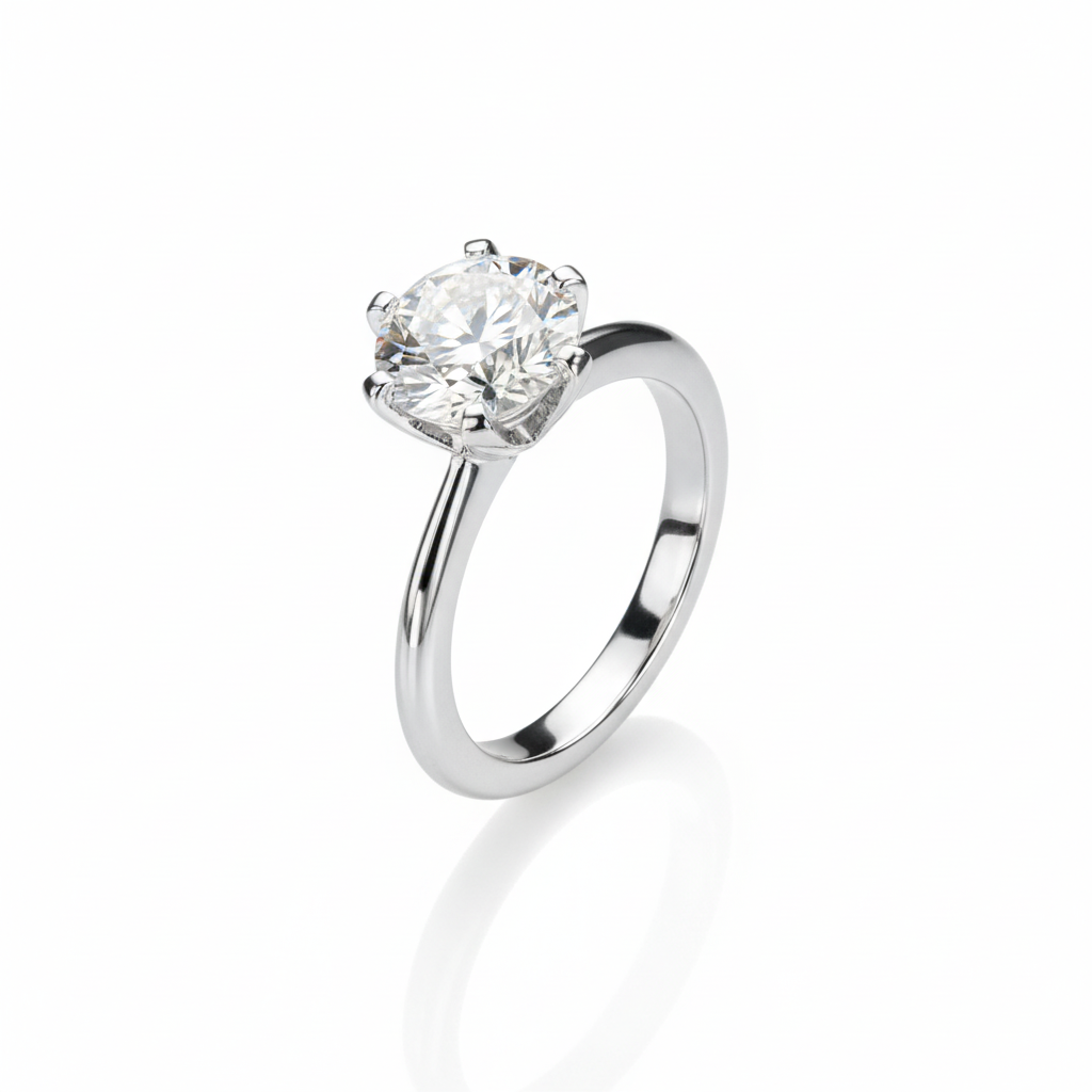 Diamond solitaire ring on white background with reflection