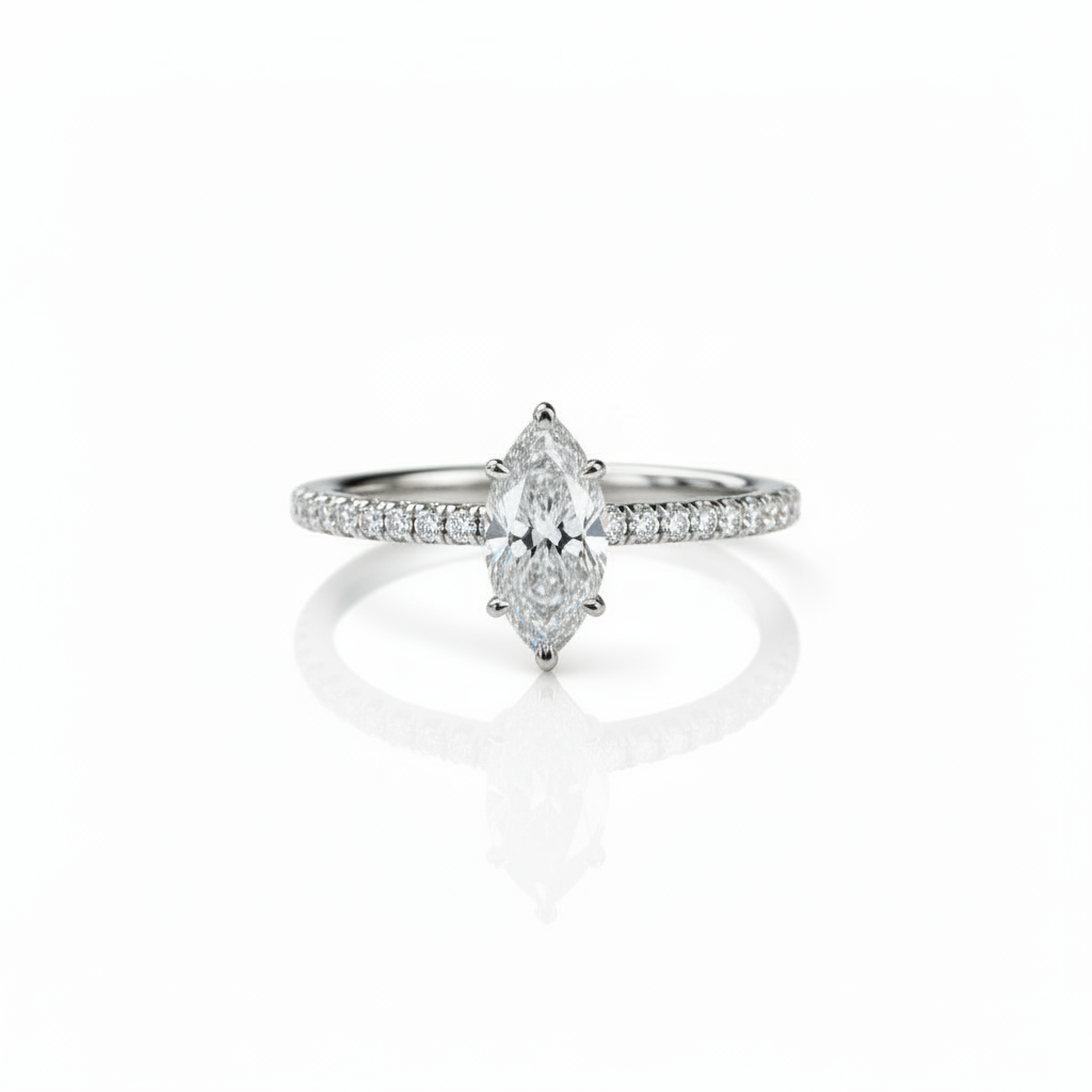 Smaller marquise diamond engagement ring with pavé